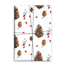  Paper Parade Stationers. Illustrated Christmas gift wrap sheet with watercolour pinecone and berries pattern. Matching gift tags available.